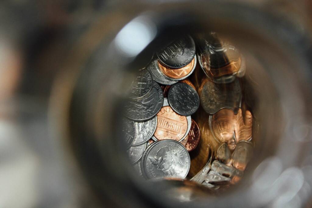 Zoomed in photo of American coins in a jar